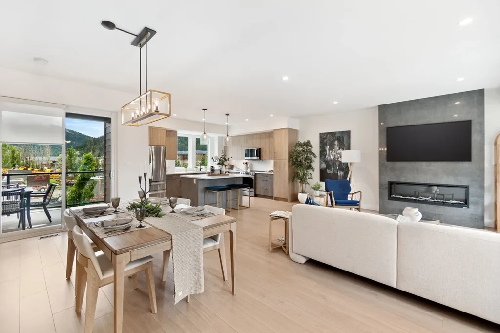 View of the dining area, living room area, kitchen and outside deck